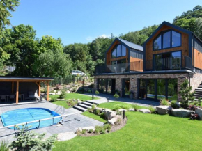 Holiday home with pool and sauna